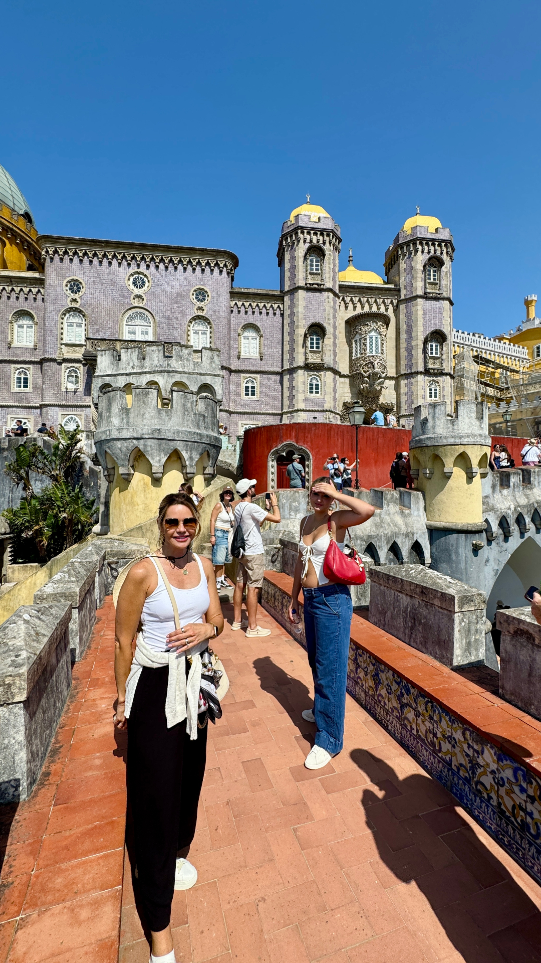 Alison in Portugal with a sweater tied around her waist